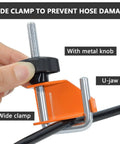 Close-up of a wide clamp with a metal knob and U-jaw from the 4 Piece Hose Pinch Off Pliers Set For Fuel Line Coolant Radiator Brake Hoses Automotive Clamp Pliers Durable Tool For Precise Fluid Control And Leakage Prevention In Vehicle Maintenance Ideal For Automotive Repair Shops And DIY Enthusiasts.