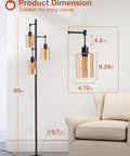 Industrial Floor Lamp With Amber Glass Shades Three Head Tree Design Tall Black Pole Lamp For Living Room Office And Bedroom Includes Three LED Bulbs And 2700K Soft Light next to sofa with dimensions.
