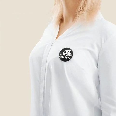 There Yet Round Button Badges 1.8 Inch Tinplate Lapel Pins on white shirt.