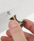 Pretty Dang Slick Antique Zinc Alloy Cabinet Drawer Pulls And Round Vanity Knobs For Kitchen Bathroom Bedroom Furniture Makeover Projects With High Quality Modern Classic Look, showing a hand holding a bronze round knob.