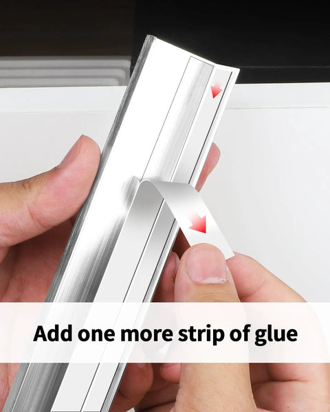 5 Pack 3 Inch Self Adhesive Cabinet Pulls Silver Stick On Handles being applied with additional adhesive strip