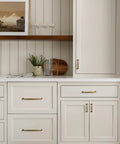 Antique Brass Cabinet Pulls Set Of 5 5 Inch Hole Center Vintage Drawer Pulls in use on cream cabinets and drawers