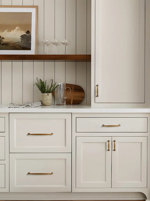 Antique Brass Cabinet Pulls Set Of 5 5 Inch Hole Center Vintage Drawer Pulls in use on cream cabinets and drawers