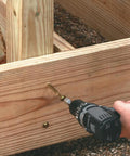 Drilling Gold Ten By Two And A Half Inch Structural Wood Screws With Washer Head And Star Drive For Interior And Exterior Use into wood