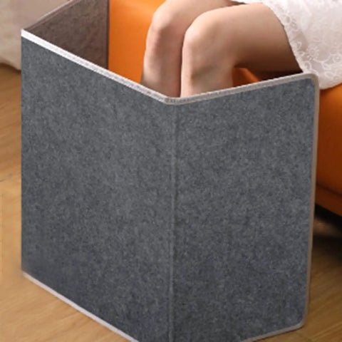Under Desk Foot Warmer With Soft Blanket For Office And Home, Five Temperature Settings, showing quiet electric foot heater in use