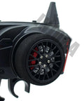 Close-up of 3 Channel 2.4G Anti-Jamming RC Transmitter With Receiver for RC Cars and Boats, steering wheel feature.