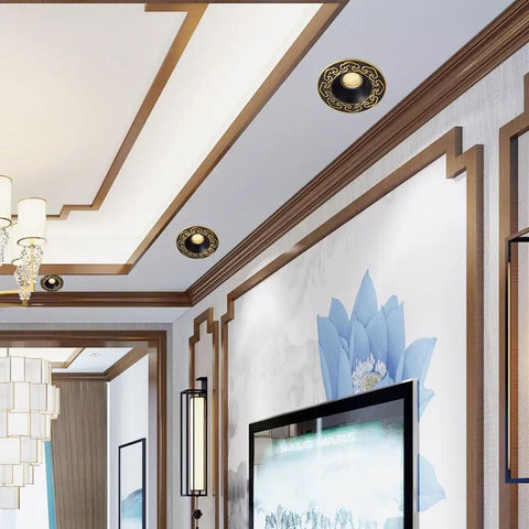 Adjustable Led Recessed Ceiling Light With Rock Solid Forged Brass Trim And Hella Bright 6000K Daylight Beam installed in a stylish ceiling.