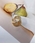 Fresh Vintage Wide Cuff Open Ring For Women Featuring A Bold Hollow Geometric Grid And Striped Texture, showing a gold cuff on soft background.