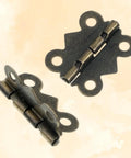 12Pcs Antique Bronze Butterfly Hinges 0.79 x 0.67 Inch With 48 Screws For Jewelry Boxes Wooden Boxes DIY Crafts Tool Boxes Cabinets And Gift Boxes Sturdy Metal Hinge Hardware For Small Projects, showing two hinges in close-up view highlighting antique bronze finish and design.