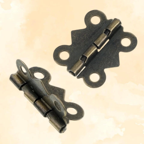 12Pcs Antique Bronze Butterfly Hinges 0.79 x 0.67 Inch With 48 Screws For Jewelry Boxes Wooden Boxes DIY Crafts Tool Boxes Cabinets And Gift Boxes Sturdy Metal Hinge Hardware For Small Projects, showing two hinges in close-up view highlighting antique bronze finish and design.