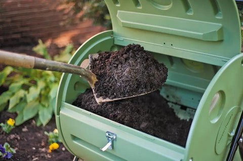 Shovel filling green Back Porch Compost Tumbler For Small Yards And Urban Spaces With Odor Control And Fully Enclosed Design