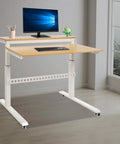 Heavy Duty Dual Tier Standing Desk With Smooth Crank Lift Tough Locking Wheels And Roomy Carbon Steel Desktop For Home Office showcasing ergonomic workspace.