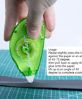 Hand using 12 Pack Double Sided Tape Roller For Scrapbooking And Crafts, Permanent Adhesive Dispenser on paper