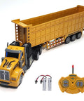 RC Dump Truck With Trailer One To Forty Eight Scale 14 Inch Mini Semi Truck Toy with remote and batteries visible