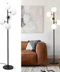 Five Light Frosted White Glass Globe Floor Lamp in Matte Black for corner rooms, shown in living area with foot switch.