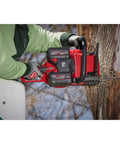 M18 Redlithium Forge 8.0 Ah Rechargeable Battery Pack Featuring Cool Cycle Active Cooling And High Output 12.0 used in chainsaw for tree cutting.