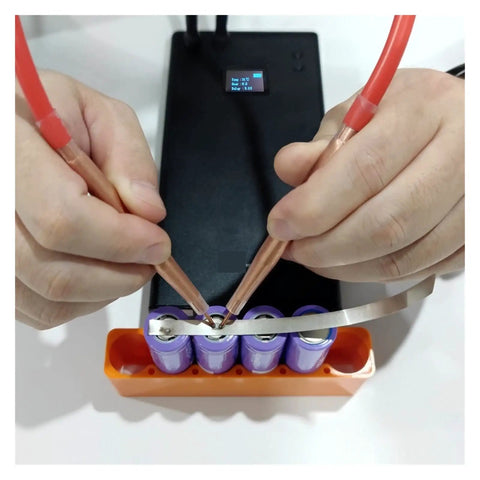 Handheld Portable Spot Welder Pen For 18650 Battery Packs And Nickel Soldering DIY Welding Tool in use on battery pack