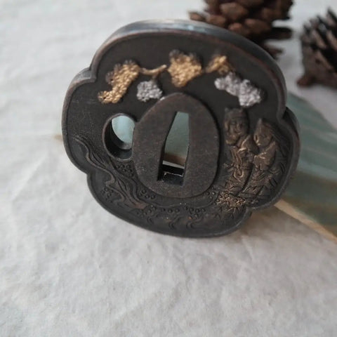 Samurai Sword Koshirae With Tsuba Alloy 081-099 Black Finish Two Girl Motif Tsuba close-up detail.