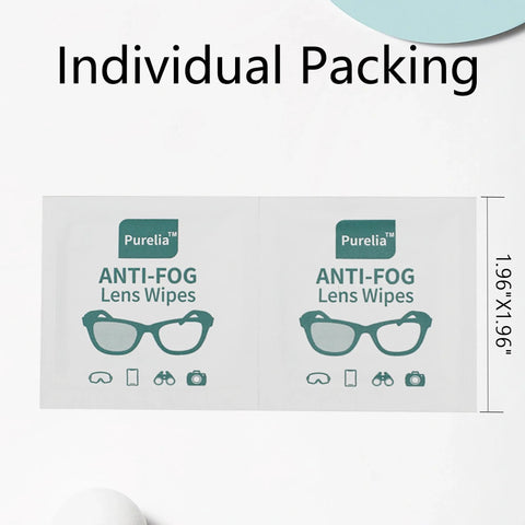 Front view of Purelia Anti-Fog Lens Wipes packets, two shown, individually wrapped wipes for eyeglasses and goggles.