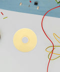 Assorted electronic components including resistors and wires on a table.