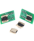 DFN8 WSON8 MLF8 MLP8 QFN8 to DIP8 Socket Adapter set on white background, showcases two green adapters for 6x5mm and 8x6mm ICs.