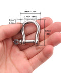 Close-up of hand holding Beefy One Quarter Inch D Ring Shackles In Grade 304 Stainless Steel With Screw Pin, showing measurements