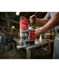 Top Tier Certified Refurbished Magnetic Drill Press Kit Built Different With A Rock Solid Kinematic Base And One Five Eighth Inch Bit Capacity For Crushing Thick Steel Plates Like Paper Smooth Operator Tool Set in use on steel.