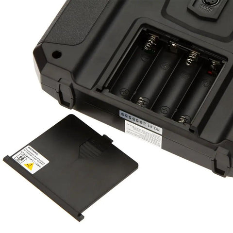 Battery compartment of Flysky FS i6 AFHDS 2A 2.4GHz 6 Channel Radio Transmitter with open cover, showing slots for 4 AA batteries