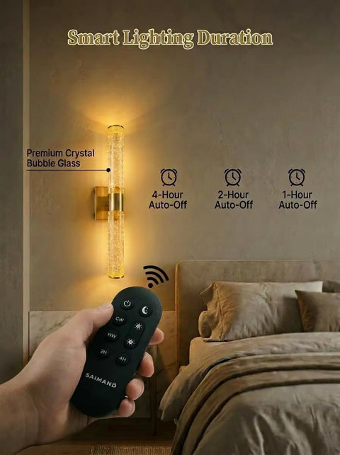 Hand holding remote in bedroom with Two Pack Battery Operated Wall Sconces With 16000mAh Rechargeable Battery, gold finish.