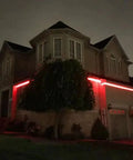 Two-story house illuminated by red WiFi LED Light Strip Kit 65.6ft Waterproof IP65 All In One Set With 5050 LEDs, UL Certified
