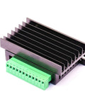 Front view of DaFuRui TB6600 stepper motor driver module with black aluminum heatsink and green terminal block