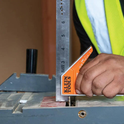 Person using 935CSEL Magnetic Combo Square Ruler For Electricians And Carpenters, Aluminum Double Sided Layout Tool With Bubble Level