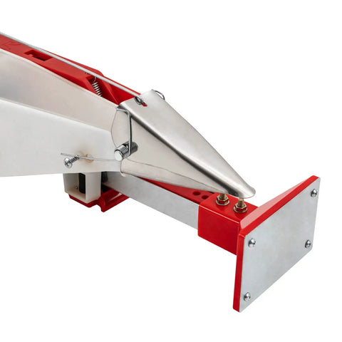 Close-up of the Manual Seed Planter With Adjustable Depth and Height for Precise Sowing on Farms, showing metal and red components.