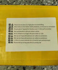 Yellow packaging with multilingual warning label stating "Please do not place at a high place to avoid falling."