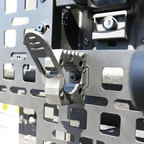 Universal MOLLE Panel Mounting Bracket Base matte black steel installed on tactical setup, showing durable powder coating.