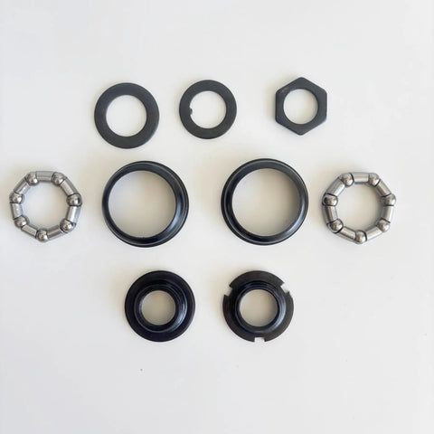 Beefy Bottom Bracket Set For One Piece Crank Bikes 1.69 Inch Cup 43mm OD Steel Frame Cups 9-Piece Kit, ball retainers visible