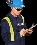 Worker wearing ALTAIR 2X Single Gas Detector For Carbon Monoxide CO 25 To 100 PPM on protective gear in industrial setting