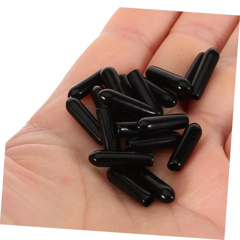 Top Notch Dishwasher Rack Tip Protectors Heavy Duty Black Plastic Prong End Caps in hand, showing multiple replacement caps.