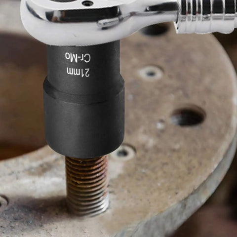 Lug Nut Removal Kit For Stripped And Frozen Bolts 21mm socket in use on rusted bolt with half inch drive and ratchet tool