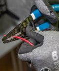 Using Wire Stripper And Cutter For 8-16 AWG Solid And 10-18 AWG Stranded Wire With Locking Mechanism in action close-up
