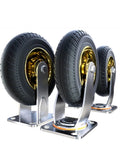 Smooth As Butter Eight Inch Heavy Duty Stem Mounted Casters With Dependable Squeeze Brakes Silent Rolling Rubber Wheels Easy Swivel Steering For Gritty Garage Workbench Upgrades showing three wheel casters with black rubber treads and metal stems.