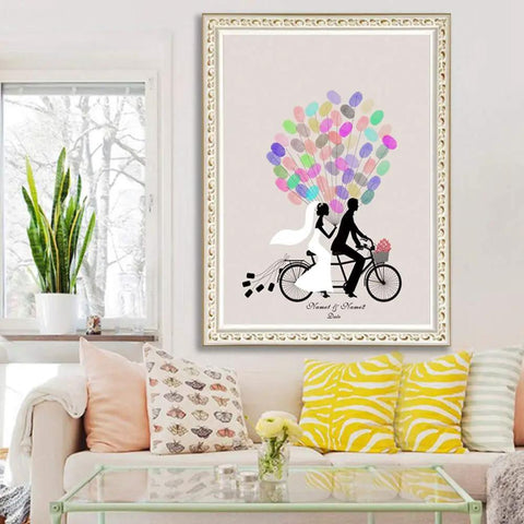 Legit Interactive Wedding Fingerprint Canvas Guest Book Pairing Six Bright Inks With A Cool Couples Bike Design hung in a cozy living room.