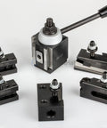 Piston Tool Post Set For CNC Lathes, High Precision Quick Change Lathe Holder, 100 Series with accessories on white background