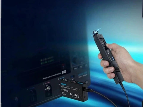 High Frequency AC DC Current Probe For Scope Testing With 50Mhz Bandwidth and Quick Swap 5A Or 30A Ranges connected to equipment.