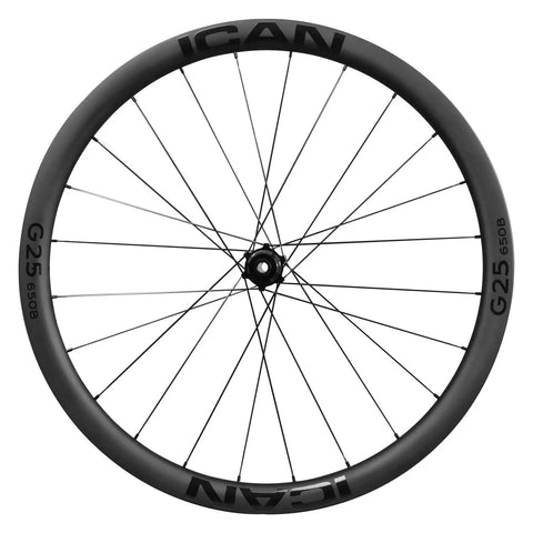 Close-up of G25 650B Gravel Wheelset Ready To Shred For Gravel Riding And Bikepacking, showcasing carbon rim and spokes.