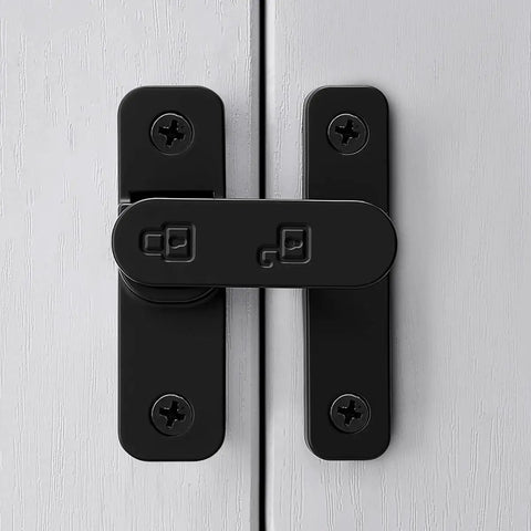 Sturdy Black Zinc Alloy Barn Door Latch With 180 Degree Slide Lock For Wood Doors on white wooden panels.