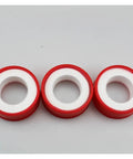 Premium Raw Thread Sealing White Teflon Tape With Pure Oil Free Formula For Tight Fitting Pipe Connections in red and white color.