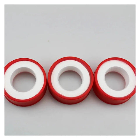 Premium Raw Thread Sealing White Teflon Tape With Pure Oil Free Formula For Tight Fitting Pipe Connections in red and white color.
