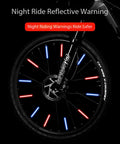 36 Pcs Cycling Reflectors In Red Yellow And Blue For Your Night Rides on bike wheel showing spoke lights in dark