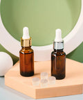 Tapered Wood Plugs For Screw Holes With Button Plug Head, displayed beside brown glass dropper bottles on a wooden hexagonal base.